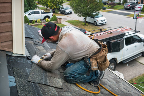 Professional Roof Leak Repair technician working in Huntington Mills, PA